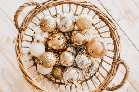 New Year basket with christmas toys on wooden floorの写真素材