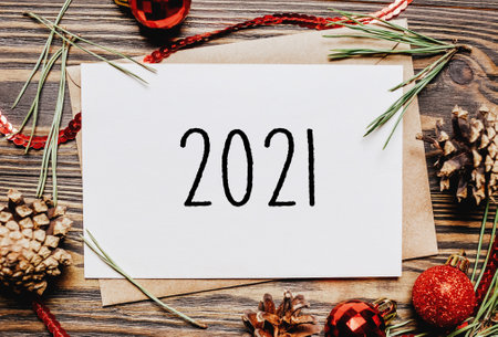 Merry christmas and merry new year concept notebook with text 2021の写真素材