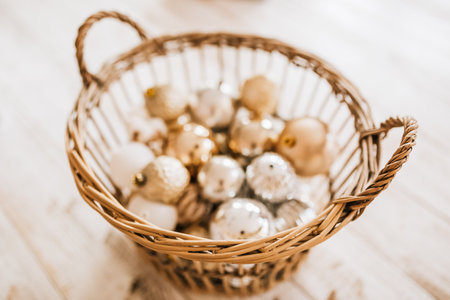New Year basket with christmas toys on wooden floorの写真素材
