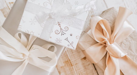 New Year gifts and Christmas toys on wooden floorの写真素材