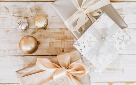 New Year gifts and Christmas toys on wooden floorの写真素材