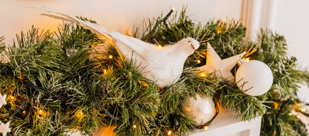 Christmas decorations at home. New year lights, toy, wreath and tree Noelの写真素材