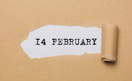 14 february on torn paper background love and valentine conceptの写真素材