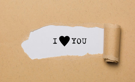 I love you on torn paper background love and valentine conceptの写真素材