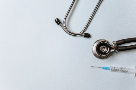 Medical concept flat lay with stethoscope on a blue backgroundの写真素材
