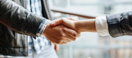 Man and woman hand shaking. Handshake after good cooperation, Businesswoman Shaking hands with Professional businessman after discussing good deal of contract. Business concept.の写真素材