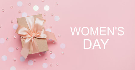 Gifts on pink background, love and valentine concept with text Womens Dayの写真素材