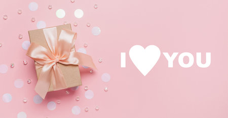 Gifts on pink background, love and valentine concept with text I love youの写真素材