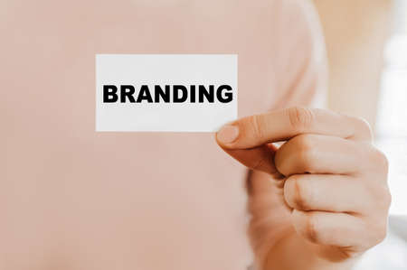 Man holding a business card with Brandingの写真素材
