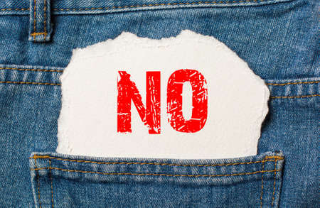 no on white paper in the pocket of blue denim jeansの写真素材