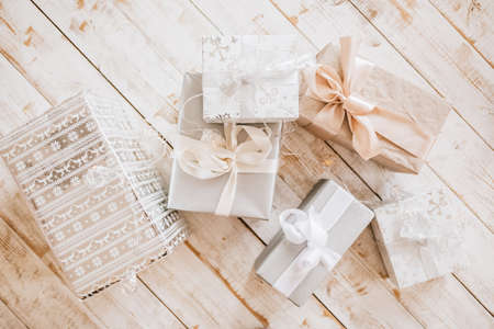 New Year gifts and Christmas toys on wooden floorの写真素材