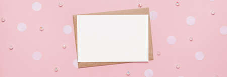 Gifts with note letter on isolated pink background, love and valentine conceptの写真素材