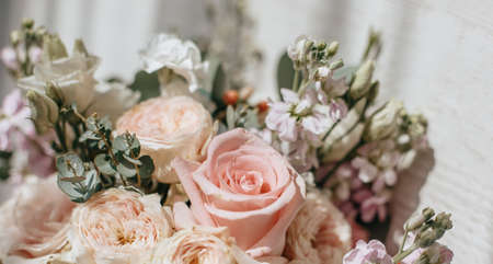 Wedding bouquet of peonies flowers on the floor of the newlywedsの写真素材