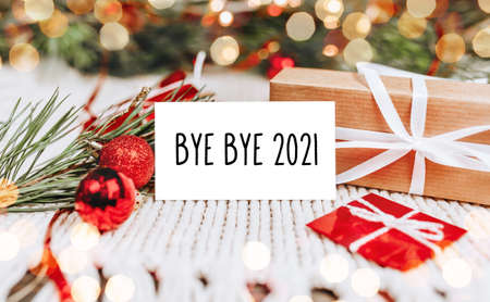 Merry christmas and merry new year concept with gift boxes and greeting card with textの写真素材