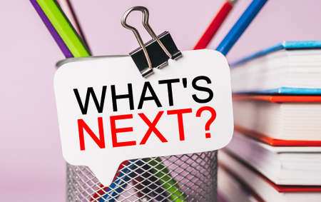 Text swhat is next mm on a white sticker with office stationery background. Flat lay on business, finance and development conceptの写真素材