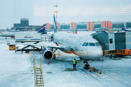 Aeroflot aircraft covered with snow waiting for maintenanceのeditorial素材