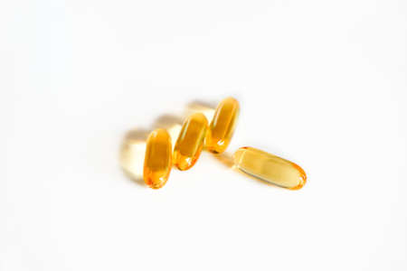 Helathy supplement - Fish oil omega 3 capsules with reflectionの写真素材