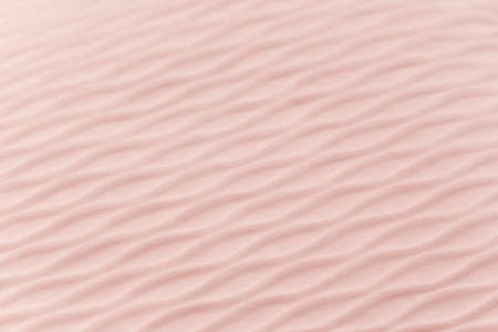 Soft blurred pale pink rib waves fabric texture backgroundの写真素材