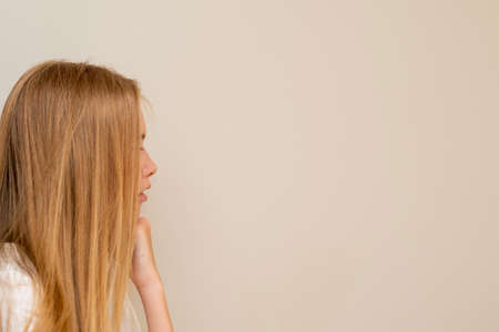 Side view of young teenager girls deep in thoughts. Thinking conceptの写真素材