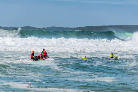 Sydney, Australia 2020-02-15 Surf rescue life savers and big waves at at Wanda Beach, NSW, Australia.のeditorial素材