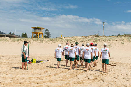 Cronulla, Australia 2020-02-15 Burning Palms Surf Life Saving Club members practicing to march with the surf reel for the March Past eventのeditorial素材