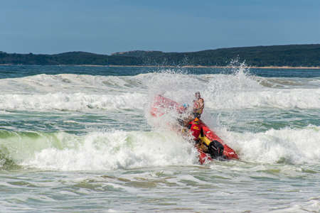 Cronulla, Australia 2020-02-15 Surf rescue life savers boat jumping on the waves at Wanda Beach, NSW, Australia.のeditorial素材
