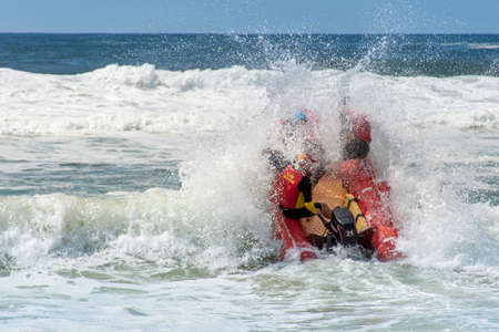 Cronulla, Australia 2020-02-15 Surf rescue life savers boat jumping on the waves at Wanda Beach, NSW, Australia.のeditorial素材