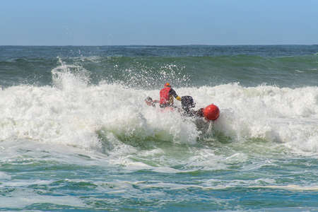 Surf rescue life savers boat jumping on the wavesのeditorial素材