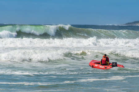 Cronulla, Australia 2020-02-15 Surf rescue life savers boat and impressive waves at Wanda Beach, NSW, Australia.のeditorial素材