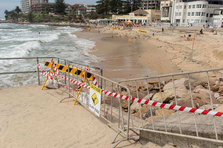 Cronulla, Australia 2020-02-15 Huge waves during the storm washed away thousands of tonnes of sand into the ocean, exposing masses of boulders at the northern end of the beachのeditorial素材