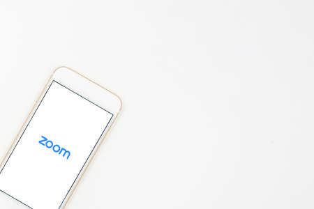 Sydney, Australia - 2020-04-06 A smart phone with zoom cloud meetings application