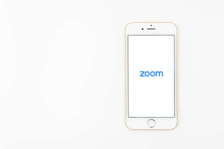Sydney, Australia - 2020-04-06 A smart phone with zoom cloud meetings applicationのeditorial素材