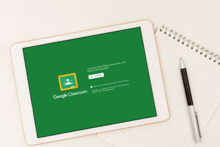 Sydney, Australia - 2020-04-06 White tablet with Google Classroom application on screen. Online education conceptのeditorial素材