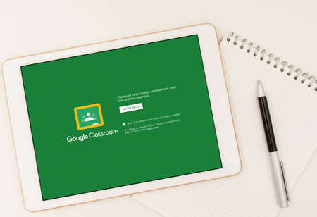 Sydney, Australia - 2020-04-06 White tablet with Google Classroom application on screen. Online education conceptのeditorial素材