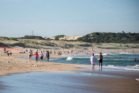 Sydney, Australia - 2020-04-17 People exercising on Wanda beach which is now Exercise zone only. COVID-19 restriction on gathering and movement. People allowed to swim, run, walk, surf and fishingのeditorial素材