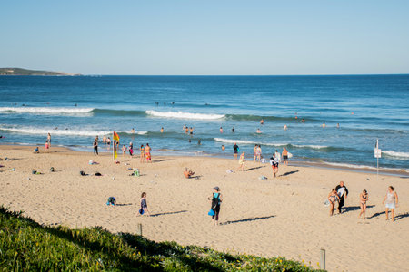 Sydney, Australia - 2020-04-17 People exercising on Wanda beach which is now Exercise zone only. COVID-19 restriction on gathering and movement. People allowed to swim, run, walk, surf and fishingのeditorial素材