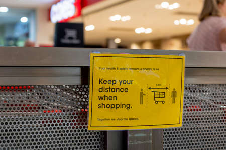 Sydney, Australia 2020-04-27 Poster about keeping social distancing when shopping to prevent spreading of the COVID-19 virusのeditorial素材