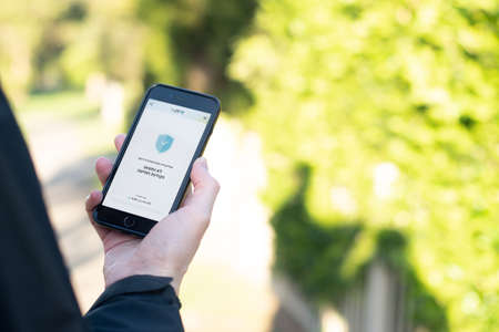 Sydney, Australia, May 2020. HaMagen app for tracing COVID-19 in Israel. Text in hebrew: Ministry of Health. For a healthier life. The protective app works all the time. No points overlap foundのeditorial素材
