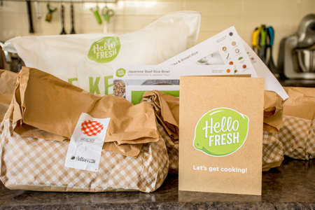 Sydney, Australia 2020-05-09 Hello Fresh meal kits packed in paper bags on a kitchen countertop.のeditorial素材