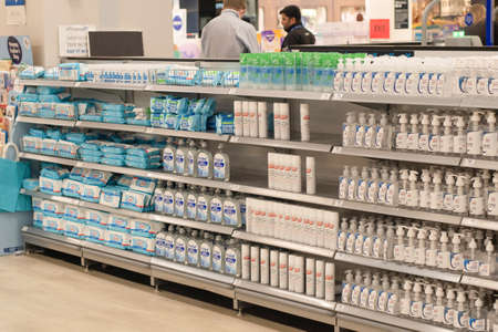 Sydney, Australia 2020-08. Shelf with sanitizers and desinfectant wipes at BigW department store...