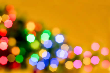 Abstract blurred disfocused Christmas lights festive backgroundの写真素材