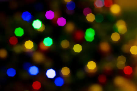 Abstract blurred disfocused Christmas lights festive backgroundの写真素材