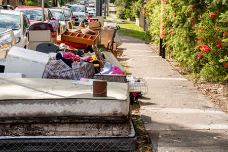 Sydney, Australia 2020-10-08 Household miscellaneous rubbish items put on curbside for council bulk waste collection.のeditorial素材