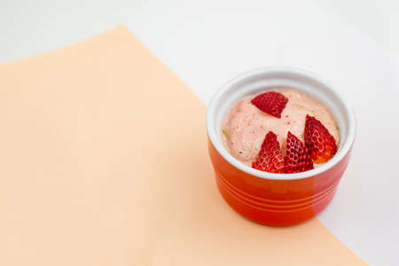 Banana nice cream with strawberries. Gluten free and dairy free healthy dessert. Blend frozen banana...