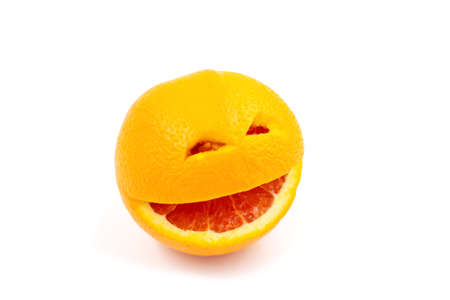 Smiling orange fruit on a white backgroundの写真素材