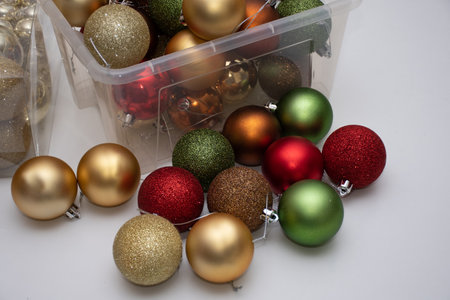 Christmas balls in a plastic transparent boxes ready to decorate a Christmas tree. Celebration conceptの写真素材