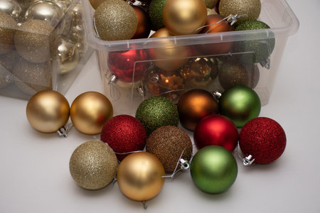 Christmas balls in a plastic transparent boxes ready to decorate a Christmas tree. Celebration conceptの写真素材