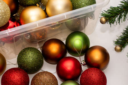 Christmas balls in a plastic transparent boxes ready to decorate a Christmas tree. Celebration conceptの写真素材
