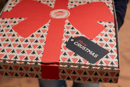 Sydney, Australia - 2019-12-06 Pizza Hut pizza in a box, takeaway carry out food for Christmas seasonのeditorial素材