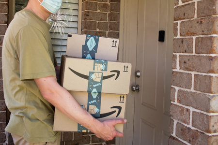 Sydney, Australia - 2020-11-29 Amazon prime boxes delivered to a front door of residential building during the COVID-19 pandemic.のeditorial素材